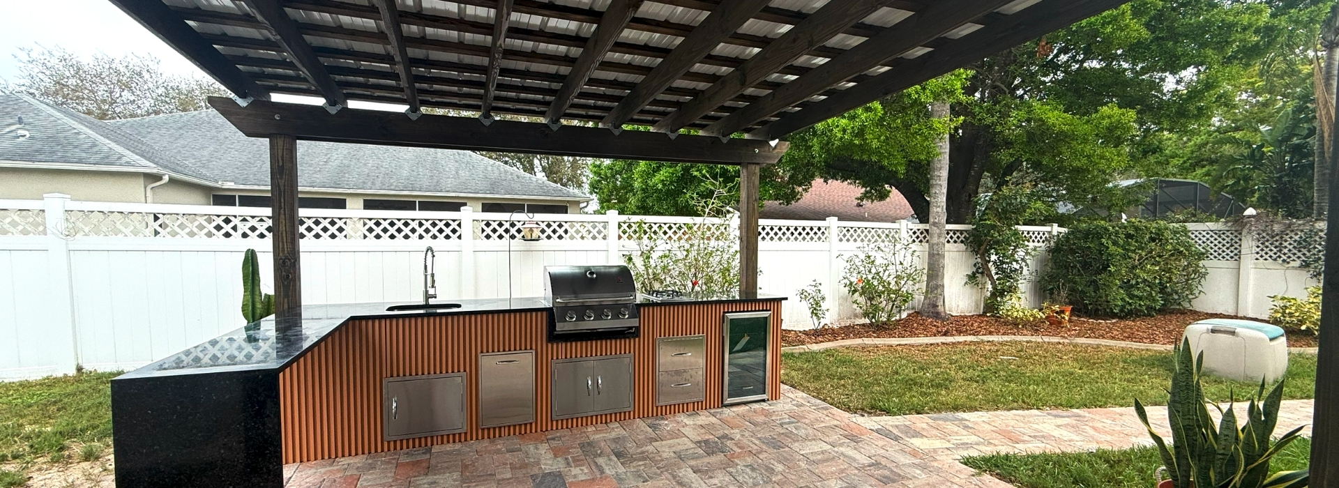 Outdoor Summer Kitchen with Pergola and Complete Cooking Station