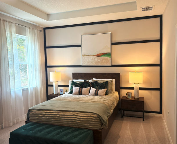 Contemporary Bedroom with Dramatic Black Accent Wall
