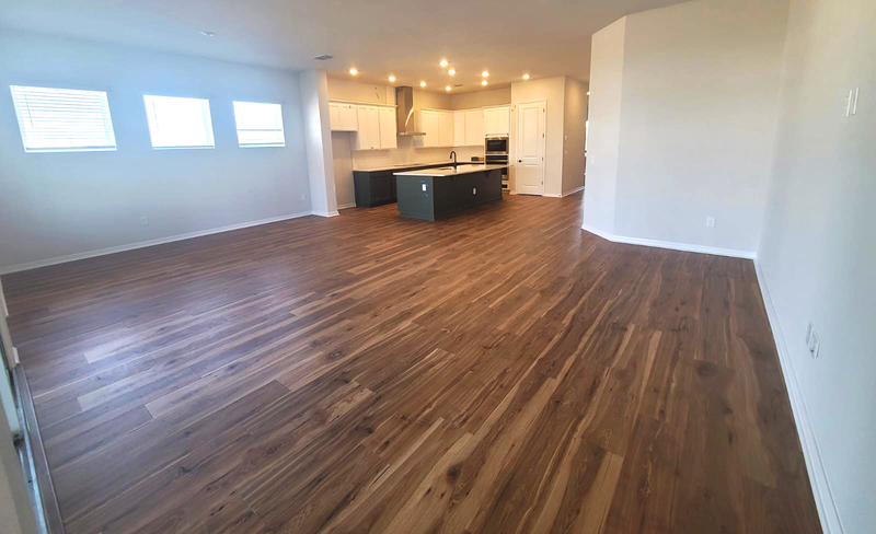 Open Concept Living with Dark Hardwood Flooring