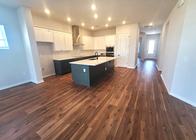 Modern Kitchen with Green Island Design